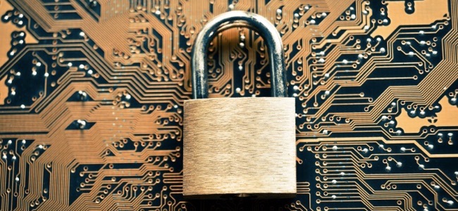 security lock on computer circuit board - computer security concept